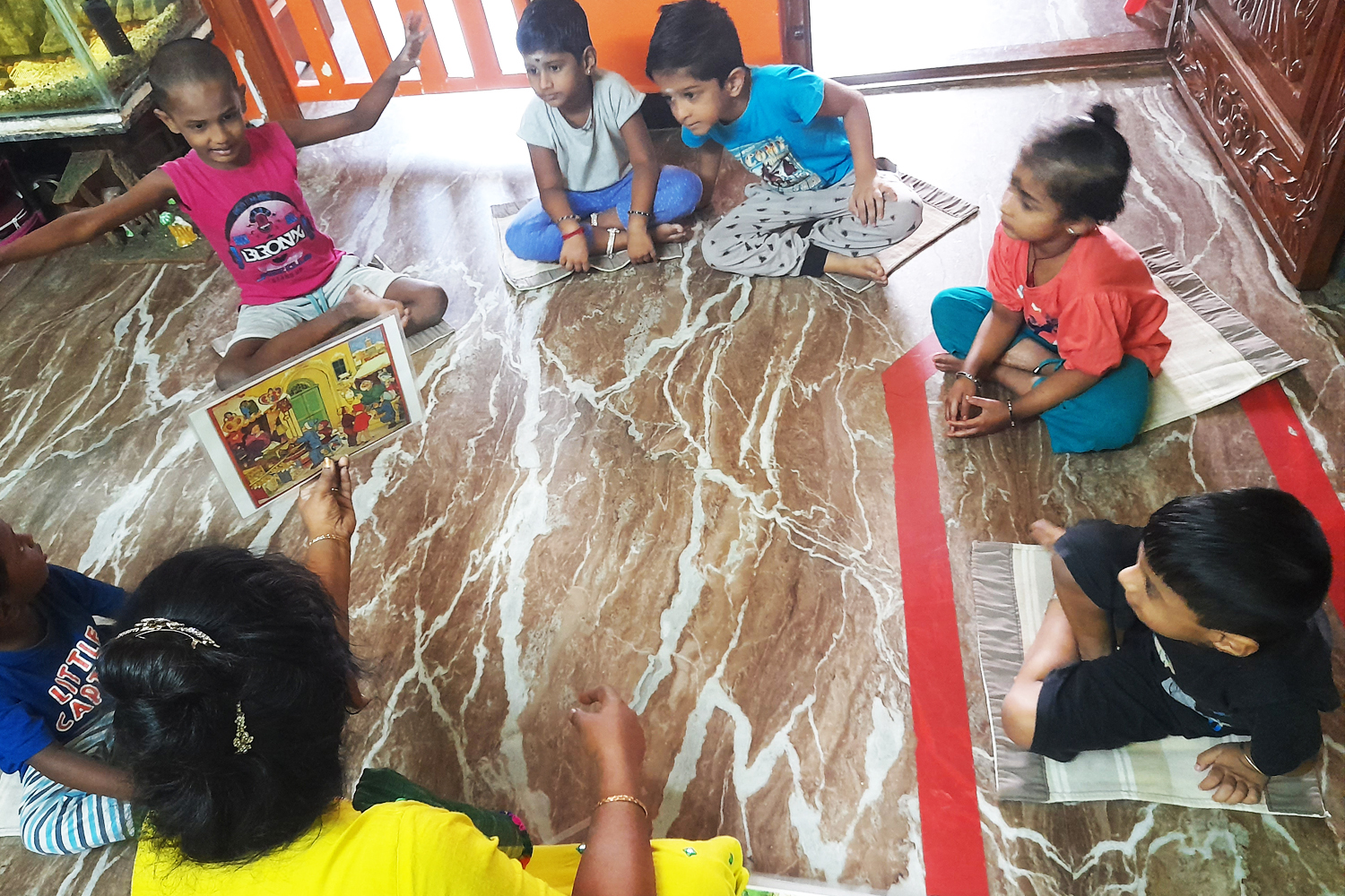 A B Cube Children in a language enhancement activity 
